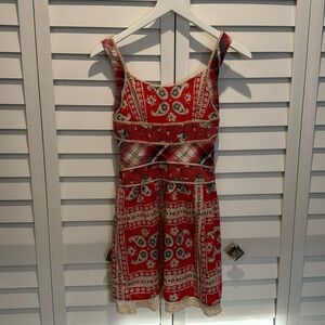 Free People Pre Loved Boho Dress with smocked Back and side buttons.